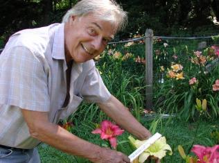 r_daniel_with_seedling-316x235